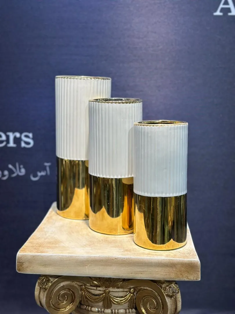 کاربرد ست گلدان در دکوراسیون - ست گلدان استوانه‌ای روی میز ناهارخوری
