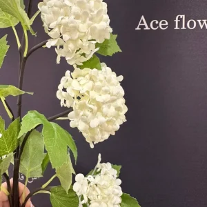 شاخه گل مصنوعی صدتومنی سفید ۷ شاخه با ساقه انعطاف‌پذیر و برگ‌های طبیعی برای دکوراسیون منزل و مراسم